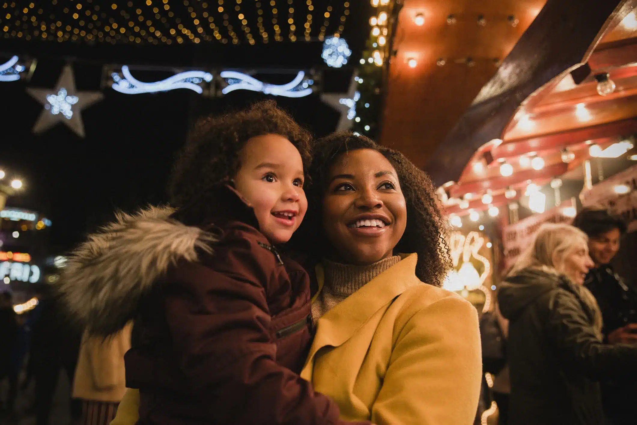 Mother and daughter at a Christmas market